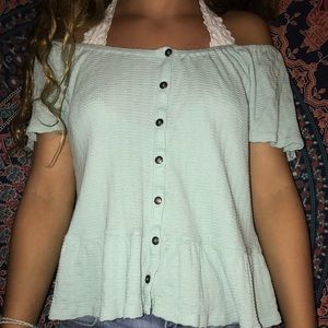 a light blue off the shoulder top